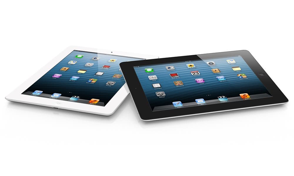Imagen de un iPad negro sobre un iPad blanco