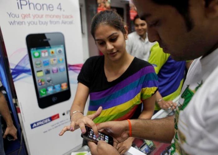 Vendedora de iPhone 4 en India