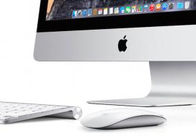 iMac con teclado y Magic Mouse